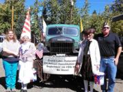 A thumb nail view of Grand Lake, Colorado during Constitution Week in September looking at a group of patriots and the Constitution Week Power Wagon before the start of the parade; click here to open a window with a larger picture.